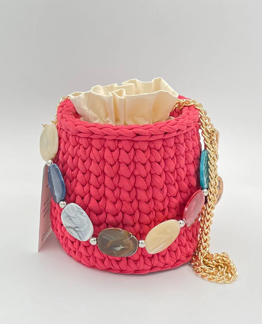 Mini basket bag in gum pink, handcrafted from recycled cotton yarn – eco-friendly and stylish accessory
