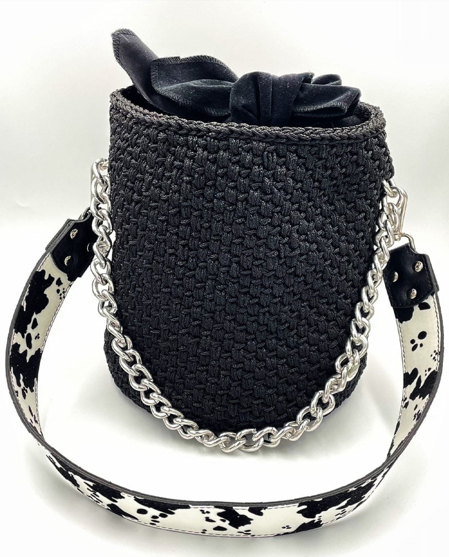 Handmade black bag with double yarn, eco-leather round base, and soft fabric drawstring – durable and eco-conscious design