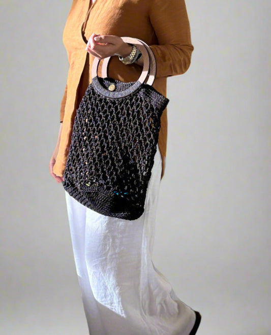 Eco-friendly handmade brown net shopping bag with wooden handles
